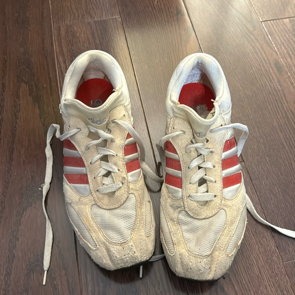 Vintage Adidas racing flats. Size 11 men’s in good condition. Only a few races.